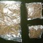Barang bukti berupa empat paket narkotika golongan 1 jenis ganja yang diamankan dari seorang warga Papua di Bitung.
