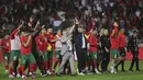 Pemain Maroko merayakan kemenangan atas Brasil pada laga uji coba FIFA Matchday di Grand Stade de Tanger, Tangier, Minggu (26/3/2023). Maroko menang dengan skor 2-1. (AP Photo/Mosa'ab Elshamy)