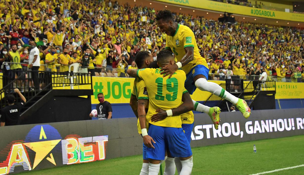 Brasil merupakan satu-satunya negara yang tak pernah absen di ajang Piala Dunia sejak 1930. Pada tahun ini, Selecao berhasil lolos dari babak kualifikasi sebagai pemuncak klasemen di zona CONMEBOL. (AFP/Nelson Almeida)