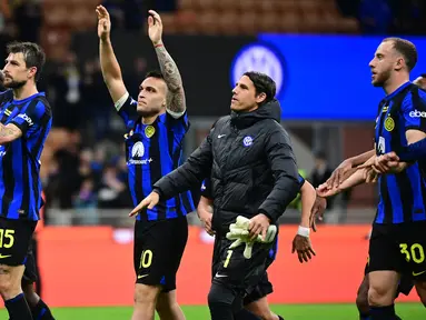 Pemain Inter Milan melakukan selebrasi usai memenangkan pertandingan sepak bola Serie A Italia melawan Empoli di Milan, pada 1 April 2024. (Piero CRUCIATTI/AFP)