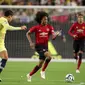 Gelandang muda Manchester United (tengah) Tahith Chong beraksi melawan Club America di University of Phoenix Stadium, Jumat (20/7/2018) WIB. (AFP/Christian Petersen)