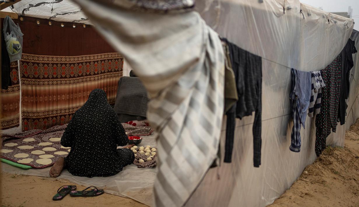 Serangan balasan Israel telah menewaskan 21 ribu orang di wilayah Palestina yang terkepung, menurut Kementerian Kesehatan di Gaza yang dikuasai Hamas. (AP Photo/Fatima Shbair)