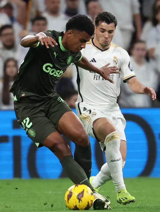 Tampil percaya diri di hadapan pendukungnya, Los Blancos bermain efektif. (Pierre-Philippe MARCOU/AFP)