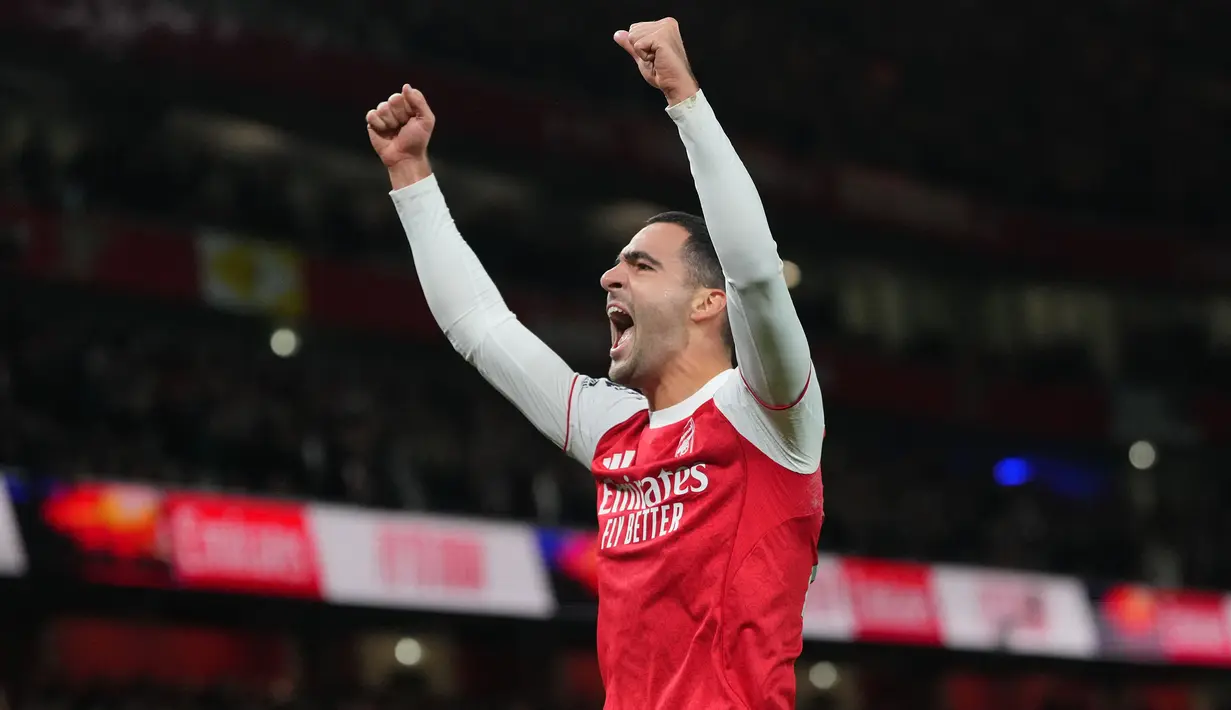 Pemain Arsenal, Mikel Merino berselebrasi setelah mencetak gol ke gawang Brentford dalam laga lanjutan Liga Inggris 2025/2026 di Emirates Stadium, London, Inggris, Rabu (03/12/2025) waktu setempat. (AP Photo/Kirsty Wigglesworth)