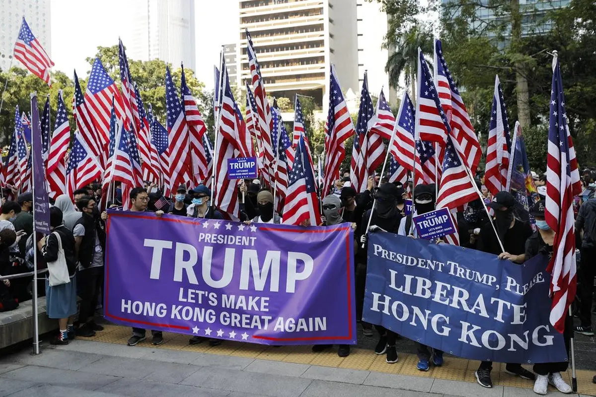 Demonstrasi digelar untuk berterima kasih kepada anggota parlemen dan presiden AS Donald Trump atas dukungannya pada Hong Kong. (AFP)