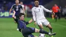 Di babak pertama, Timnas Indonesia tertinggal tiga gol dari Jepang. Tiga gol tersebut dicetak Daichi Kamada (15, 45+6), Takefusa Kubo (19). (PAUL MILLER/AFP)