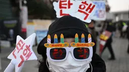 Pelarangan tersebut imbas dari upaya Presiden Yoon Suk Yeol untuk memberlakukan darurat militer, pada Selasa (3/12/2024) malam pekan lalu. (Jung Yeon-je/AFP)