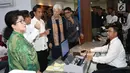 Presiden Joko Widodo saat menemani Managing Director IMF Christine Lagarde melihat fasilitas pelayanan dengan menggunakan Kartu Indonesia Sehat (KIS) untuk kesehatan masyarakat  di RSPP Jakarta, Senin (26/2). (Liputan6.com/Angga Yuniar)