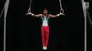 Atlet timnas Indonesia Dwi Samsul Arifin cabang olahraga senam artistik putra bersiap tampil dalam Sea Games 2017 di Mitec, Kuala Lumpur, Malaysia, Selasa (22/8). (Liputan6.com/Faizal Fanani)