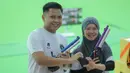 Berlaga di Shooting Racne Sports Authority of Thailand, Iqbal/Arista sukses berhasil membekuk wakil Vietnam, Trinh Thu Vinh/Pham Quang Huy, dengan skor 17-9. (Bola.com/Bagaskara Lazuardi)