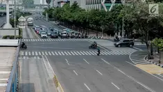 Kendaraan bermotor melintas di kawasan Jalan Thamrin, Jakarta, Sabtu (1/6/2019). Sejumlah ruas jalan rawan macet di Ibu Kota saat ini terpantau lengang dan lancar. (Liputan6.com/Faizal Fanani)