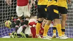 Penyerang Manchester United (MU) Cristiano Ronaldo mencetak gol yang dianulir ke gawang Wolverhampton Wanderers dalam pekan ke-22 Liga Primer Inggris di Old Trafford, Selasa (4/1/2022) dini hari WIB. MU takluk 0-1 saat menjamu Wolves. (AP Photo/Dave Thompson)