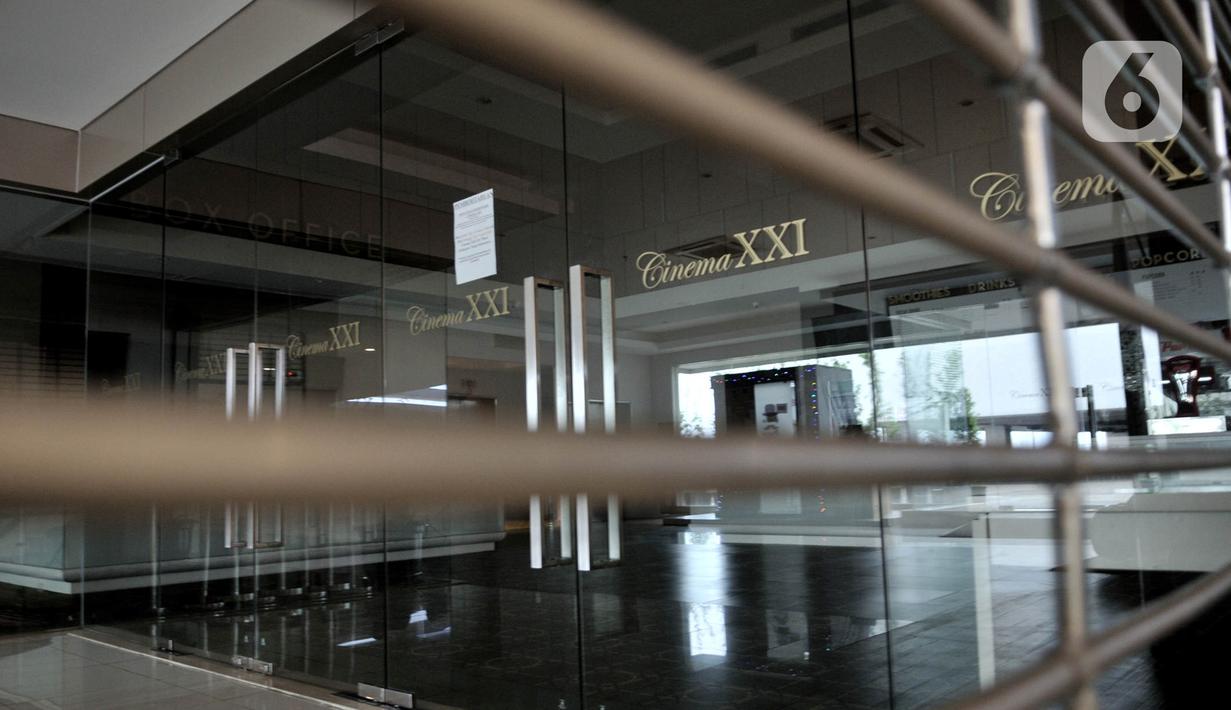 Suasana Cinema XXI di salah satu pusat perbelanjaan kawasan Jakarta Timur ditutup sementara, Senin (23/3/2020). Guna mencegah penyebaran Covid-19, bioskop Cinema XXI di DKI Jakarta dan beberapa kota di Indonesia ditutup sementara mulai hari ini hingga 5 April 2020. (merdeka.com/Iqbal S. Nugroho)