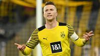Marco Reus telah menjadi motor permainan di lini tengah Borussia Dortmund selama bertahun-tahun. Pria berusia 33 tahun tersebut mampu tampil gemilang pada musim ini dengan mencetak 13 gol dan 13 assist dalam 34 penampilannya. (AFP/Ina Fassbender)