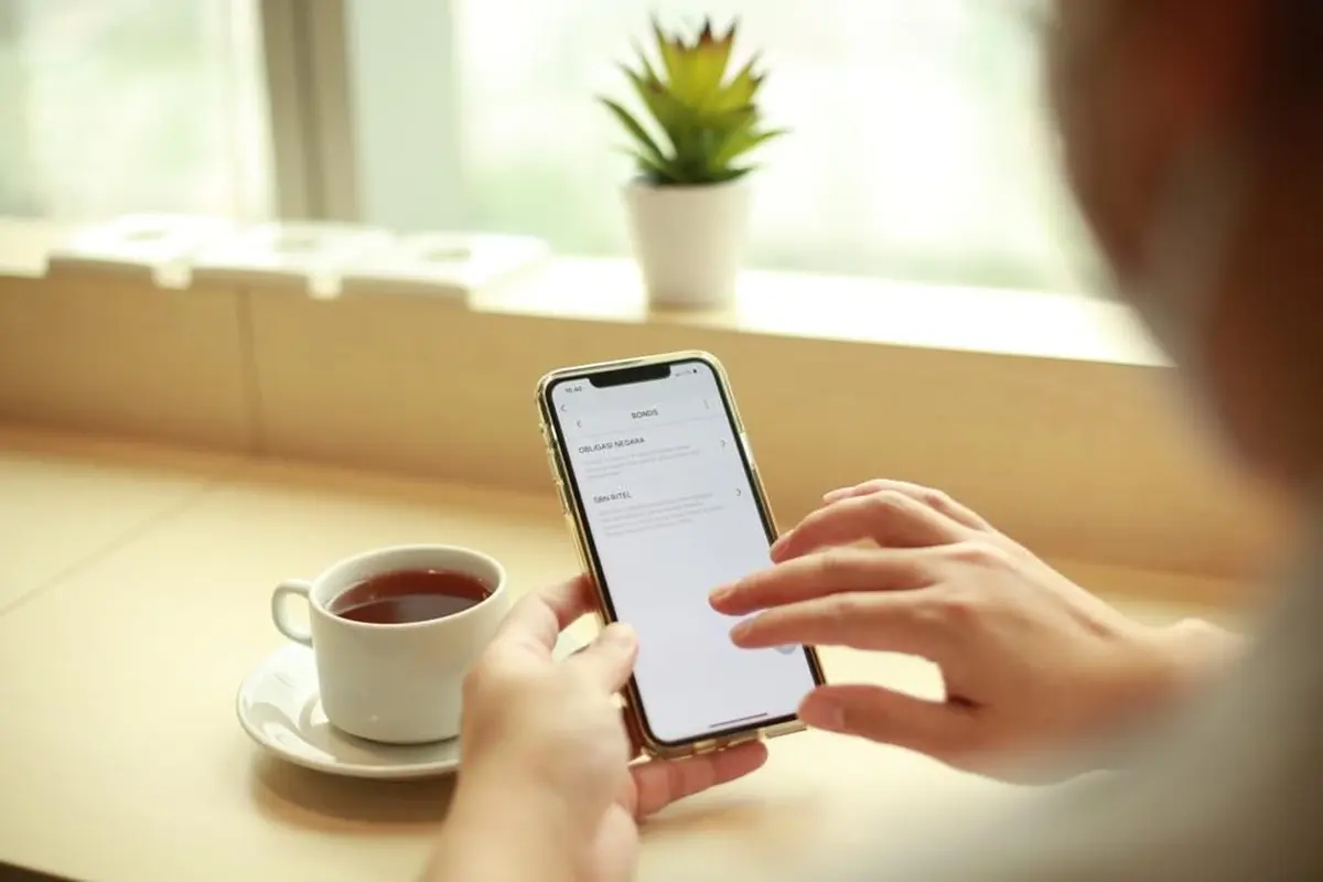 Nasabah melakukan pembelian Savings Bond Ritel seri SBR010 menggunakan OCTO Mobile dari CIMB Niaga.