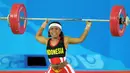 Dunia olahraga Indonesia tengah berduka setelah legenda angkat besi Lisa Rumbewas meninggal dunia. Lisa Rumbewas dikabarkan tutup usia di RSUD Jayapura, Papua, pada Minggu (14/1/2024) sekitar pukul 03.00 WIT. (AFP/Jung Yeon-Je)