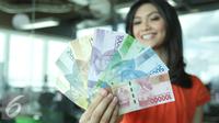 Bank Indonesia (BI) meluncurkan 11 uang rupiah Emisi 2016 dengan gambar pahlawan baru. (Liputan6.com/Fatkhur Rozaq)