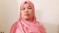 Melalui PJTI, Siti Hasanah TKW asal Karawang dijanjikan bekerja di Qatar. Lima hari bekerja Siti melarikan diri dan mengabarkan dirinya ada di rumah warga di Libia. (Liputan6.com/ Abramena)