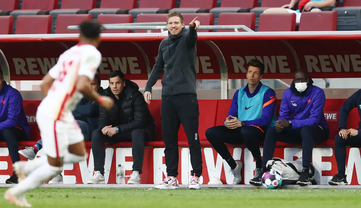 Fleksibilitas Taktik - Julian Nagelsmann dikenal sebagai juru taktik yang dapat bermain dalam sejumlah formasi di setiap laga. Strategi pelatih RB Leipzig ini bahkan kerap membingungkan lawan karena menerapkan formasi yang aneh dan berubah-ubah. (AFP/Rolf Vennenbernd)