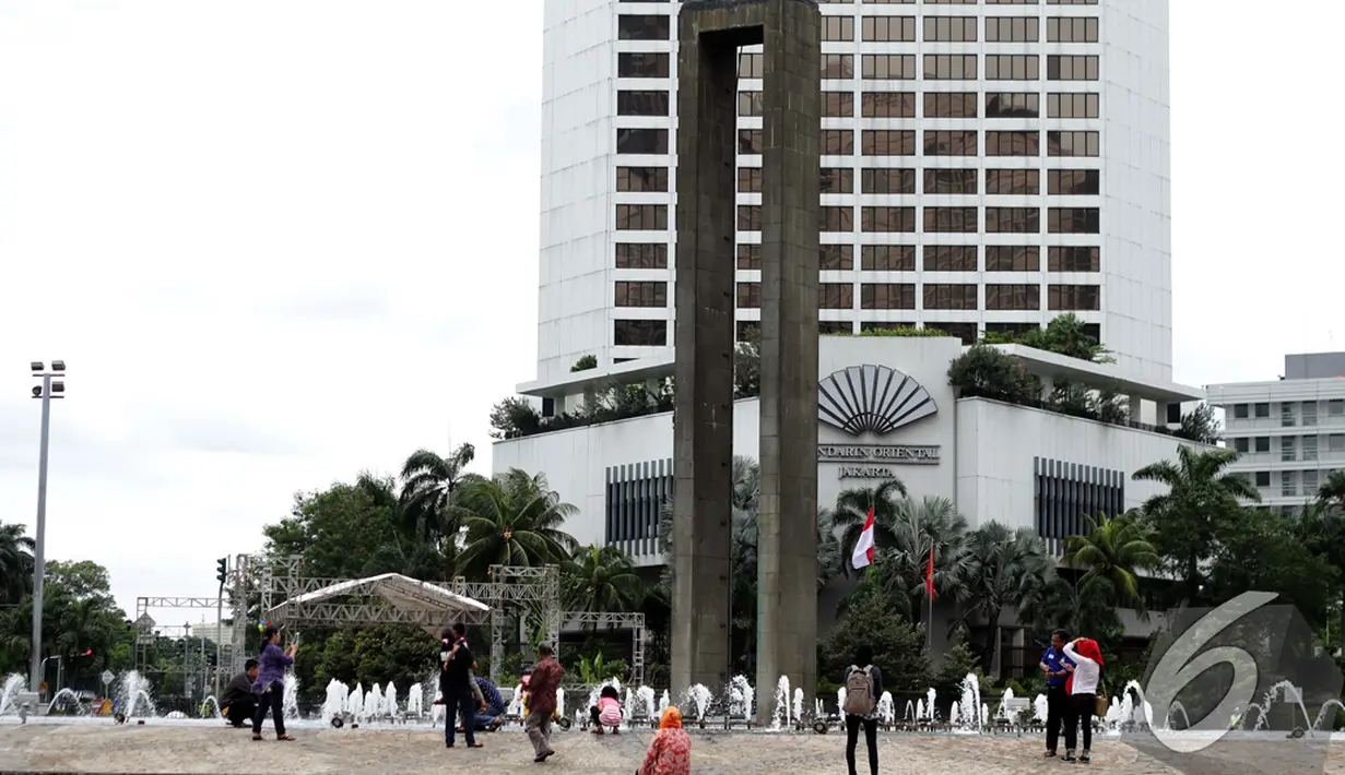 Hari libur Tahun Baru dimanfaatkan warga Jakarta untuk berwisata bersama keluarganya, Jakarta, Kamis (1/1/2015). (Liputan6.com/Faizal Fanani)