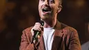 "Aku tahu kalian miliki masalah. Aku juga miliki masalah berat," ujar Sam Smith di konsernya. (HollywoodLife)