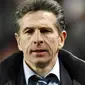 Ekspresi pelatih Lyon, Claude Puel seusai berakhirnya laga lawan AS Monaco dalam lanjutan Ligue 1 yang digelar di Louis II Stadium, Monaco, 20 Desember 2009. Partai berakhir 1-1. AFP PHOTO/VALERY HACHE 