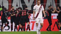 AC Milan meraih kemenangan 1-0 atas Torino pada laga pekan ke-10 Serie A di San Siro, Rabu (27/10/2021) dini hari WIB. Gol tunggal Milan dicetak Olivier Giroud pada menit ke-14. (AFP/Marco Bertorello)