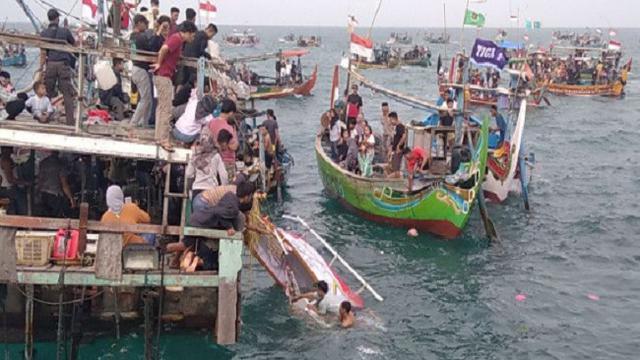 Tradisi Melarung Kepala Kerbau