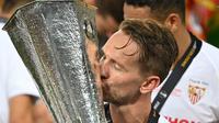 Striker Sevilla, Luuk de Jong, berhasil mencetak dua gol dan membantu timnya menang 3-2 atas Inter Milan pada laga final Liga Europa di RheinEnergieStadion, Sabtu (22/8/2020) dini hari WIB. (AFP/Ina Fassbender / POOL / AFP)