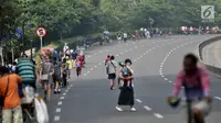 Aktivitas pengunjung Hari Bebas Kendaraan Bermotor atau car free day (CFD) di Bundaran HI, Jakarta, Minggu (20/5). selama bulan Ramadan, jumlah pengunjung CFD di kawasan MH Thamrin dan sekitarnya menurun dra. (Merdeka.com/Iqbal S Nugroho)