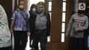 Terdakwa dugaan tindak pidana korupsi pengadaan tanah di Munjul, Rudy Hartono Iskandar bersiap mengikuti sidang pembacaan tuntutan di Pengadilan Tipikor Jakarta, Kamis (10/2/2022). Rudy Hartono Iskandar dituntut pidana penjara selama 7 tahun dan denda 500 juta. (Liputan6.com/Helmi Fithriansyah)
