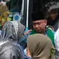 Prosesi pelepasan keberangkatan jemaah haji asal Garut, Jawa Barat di halaman Pendopo, Garut. (Liputan6.com/Jayadi Supriadin)