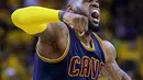 Ekspresi LeBron James dari Cleveland Cavaliers ketika berhasil mengantarkan timnya meraih kemenangan atas Golden State Warriors di final basket NBA. (AP/Ben Margot)