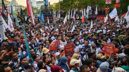 Aksi tersebut menggemakan beragam tuntutan untuk perubahan sosial kehidupan, terutama para pekerja. (Juni KRISWANTO/AFP)