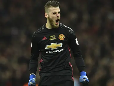 David de Gea menjadi salah satu pemain incaran Real Madrid pada bursa transfer januari 2018, kapten Real Madrid Sergio Ramos ikut mendesak klub tersebut untuk menandatangani kontrak dengan kiper Setan Merah tersebut.  (AFP/Glyn Kirk)