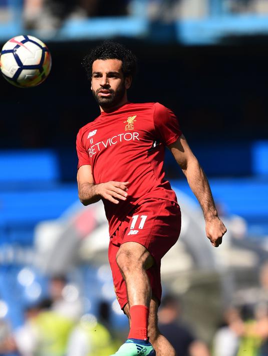Namun ada banyak kendala yang akan dihadapi Madrid mendatangkan Salah. Satu diantaranya kontrak Salah yang baru diperpanjang Liverpool yang membuat harganya langsung melonjak tajam. (AFP/Glyn Kirk)