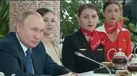 Presiden Rusia Vladimir Putin bertemu para pramugari untuk bahas dampak invasi Ukraina. Dok: RT