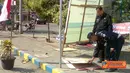 Citizen6, Surabaya: setelah satpam kampus dan mahasiswa bernegosiasi, pembongkaran tersebut tidak di lanjutkan. (Pengirim: Nias Stovit)