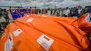 Bantuan logistik yang dikirim terdiri dari obat-obatan, makanan, tempat penampungan sementara dan penyuling air bersih. (BAY ISMOYO/AFP)