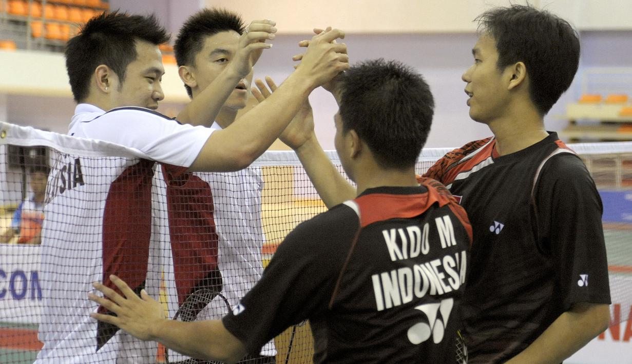 Medali emas Ganda Putra SEA Games. Markis Kido/Hendra Setiawan mengoleksi 3 medali emas di SEA Games 2005, 2007 dan 2009. Pada final SEA Games 2009 yang digelar di Laos, mereka mengalahkan musuh bebuyutan dari Malaysia, Koo Kien Keat/Tan Boon Heong dengan skor 21-17, 21-17. (Foto: AFP/Liu Jin)