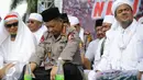(Ki-ka) Ustad Arifin Ilham, Kapolri Jenderal Tito Karnavian dan Imam Besar FPI Habib Rizieq Syihab memantau demo 2 Desember di Monas, Jakarta, Jumat (2/12). Kapolri bergabung dengan massa yang menggelar doa bersama. (Liputan6.com/Faizal Fanani)