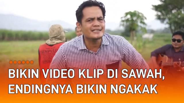 Tiga pria bikin video klip musik di hamparan sawah mengundang perhatian