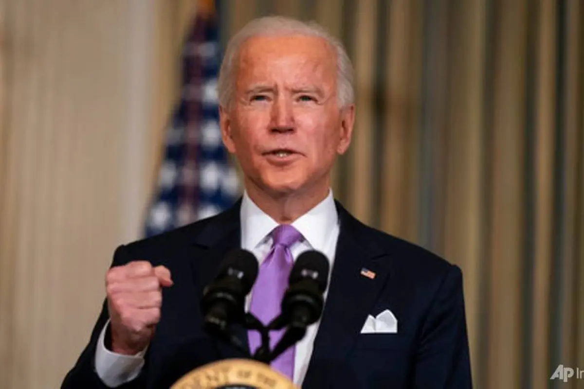 Presiden AS Joe Biden menyampaikan pidato tentang kesetaraan rasial di Ruang Makan Negara Gedung Putih pada 26 Januari 2021, di Washington.