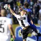 Juventus' Kingsley Coman (rear) fights for the ball with Parma's Jose Mauri during their Italian Serie A soccer match at Tardini Stadium in Parma April 11, 2015. REUTERS/Giorgio Perottino