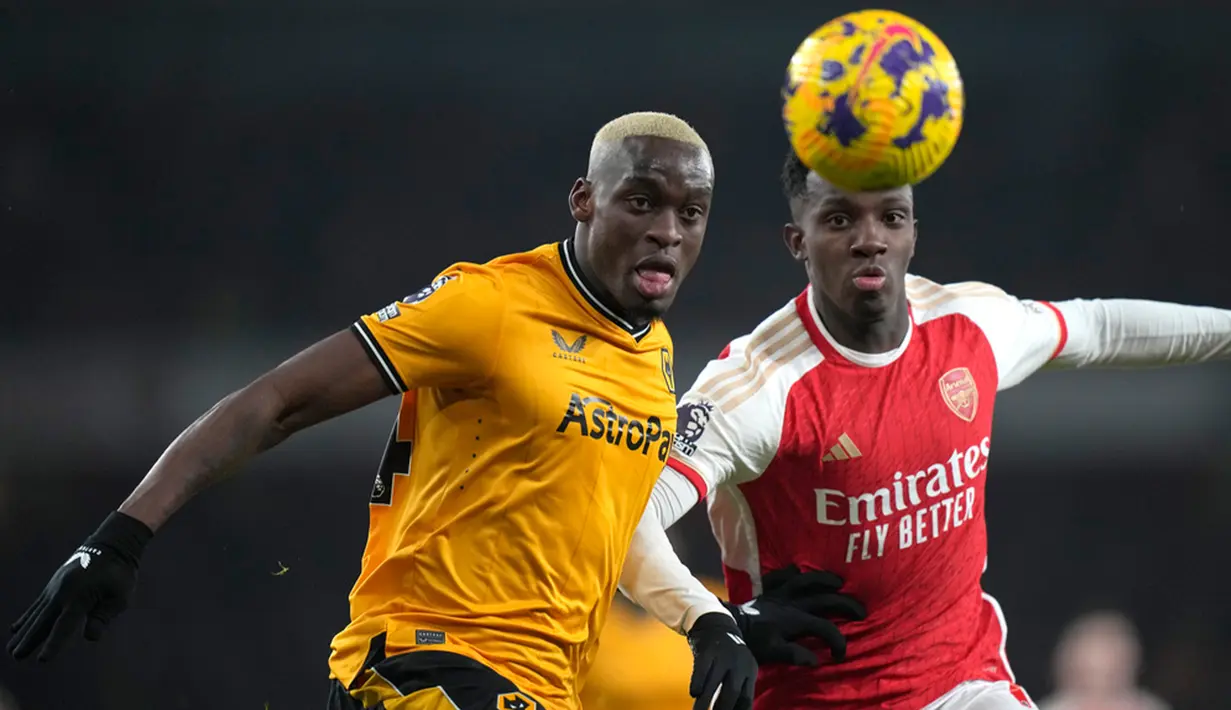Hasil ini membuat Arsenal masih di puncak klasemen dengan 33 poin dari 14 pertandingan. (AP Photo/Alastair Grant)
