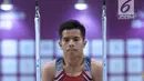 Pesenam muda Indonesia, Ritung Ken saat beraksi di Kejuaraan Senam Artistik Junior Asia ke-15 di Istora Senayan, Jakarta, Rabu (25/4). Ajang ini menjadi wadah bagi atlet Indonesia jelang laga di Asian Games 2018. (Liputan6.com/Helmi Fithriansyah)