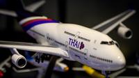 Ilustrasi Thai Airways. (dok. Foto Mladen ANTONOV / AFP)