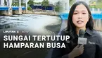 Hamparan busa di aliran Kanal Banjir Timur Marunda, Cilincing, Jakarta Utara. Ada Michaela Winda di sana.