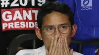 Ekspresi Wakil Gubernur Sandiaga Uno saat menghadiri peresmian sekretariat bersama Partai Gerindra - PKS dan PAN di Jakarta, Jumat (27/4). (Liputan6.com/JohanTallo)