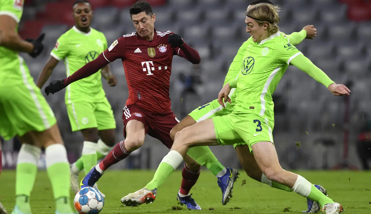 Mesin Gol Bayern Munchen itu membukukan gol terakhir Die Roten di tiga menit terakhir pada laga melawan Wolfsburg di Allianz Arena. (AP Photo/Andreas Schaad)